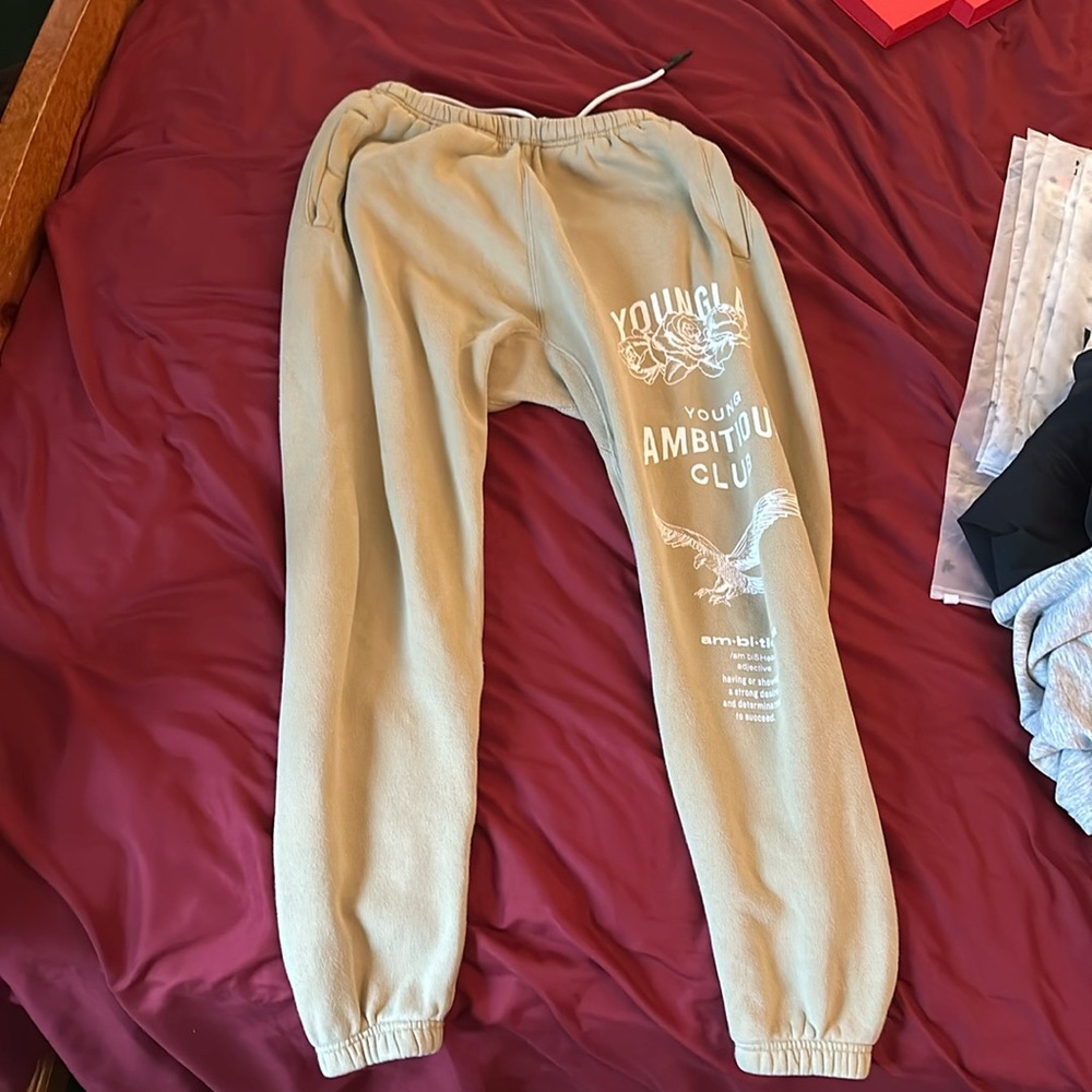 233 THE IMMORTAL JOGGERS FALL 22": Trench Coat Medium